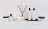 Modern Classics Bundle - Pomegranate & Spiced Woodas - Bathtime Bundle - Scented Candle Tumbler (90 s 80mm) - Reed Diffuser (120ml) - Mineral Bath Salts (340g)