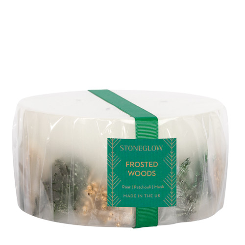 The Frosted Woods 3-wick candle contains decorative botanicals encapsulated within, adding to that festive feeling and making for the perfect centre piece for your Christmas banquet.