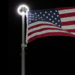 LED Solar Powered Flag Pole Down Light, 200 Lumens, 26 High Output 2835 SMD LED's, IP65, 5 Year Warranty.

This is our best value solar flag pole light. The fixture is a very high end, high powered LED solar powered flag pole down light. The installation allows you to display your flag with pride and proper illumination. Very high 900 Lumen output. Using 26 ultra bright 2835 SMD LED's. This light is at the much higher end of illumination compared to others. By installing the LED solar flag pole light no need to constantly raise flag in the morning and lowering flag at night.

Light sensor is completely automatic which means no switches to forget to flip. The light turns on at night and turns off at daylight. Fast and easy no hassle installation. Simply lower your pole and fit solar fixture under the truck that rest at the top of the pole. Must be sure light is in the "on" mode with the on/off button before installing. No tools required. No electrician or electrical contractor required.

The fixture features a compact all-in-one design. The 5.5V 1.8 watt solar panel is built into the fixture which converts more solar energy into electricity to be stored. The high efficiency solar panels for this light offer a maximized area utilization ratio and the conversion efficiency exceeds all the similar products on the market. Solar flag pole down light has built in 3x1.2V 2000mAh Ni MH rechargeable batteries.

Working time up to 10 hours on a full charge. High IP65 rating for high resistance to most weather conditions, such as wind, rain and dust. Constructed of impact resistant ABS for long life trouble free operation. We back our quality with an industry leading 5 year warranty. Please note, there is no ball, no bolt, no ornament, no flag, or flag pole is included in the package.