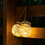 LED Solar Powered Glass Bottle Light, Waterproof, Outdoor, Garden Decoration Light, 20 LED Copper Light String, 2 Pack.

These are a great way to add attractive high tech lighting with a no hassle installation. Product is self contained with no wires to connect to illuminate. LED solar glass bottle light can be hung on trees or placed on flat surface. The light color is a very pleasing warm white. Light will come on at dusk and go off at daylight automatically. Working 8 hour night light life. Product uses a 2V 800mA poly-crystalline solar panel. Our solar panel can be charged even in rainy days. Solar panel is protected by a stainless steel cover. Charging time in direct sunlight 4 to 8 hours. Battery is AA 1.2V 600mAh Rechargeable.

Combination of natural hemp rope handle and stainless steel fixing ring which is not only beautiful but flexible and firm. Solar bottle light has an intelligent light control mode. St one and no need to repeat switch. There is a control switch at the bottom of the Battery box. Product will automatically charge in the day time. At night the light will illuminate automatically. We back or quality with a very strong 2 year warranty.
Product Technical Data:
SKU: GS-SBL-1137
Ref: 1137
Brand: LSS
Kelvin Temp: 3500K
480 Option: No
Weight:   1.4Lbs.
Height: 5.7 Inches
Diameter: 4.9 Inches
Light Source: LED
LED Type: 20 LED Copper String
IP: 55
Life Time: 50,000 Hours
Warranty: 2 Years