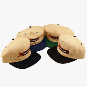 Creme colored hat with colored bill Creme colored hat with colored bill