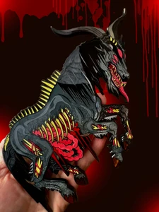 HORGOG, an oversized monster enamel pin that is large and rich with features such as multiple glitters and glow in the dark.