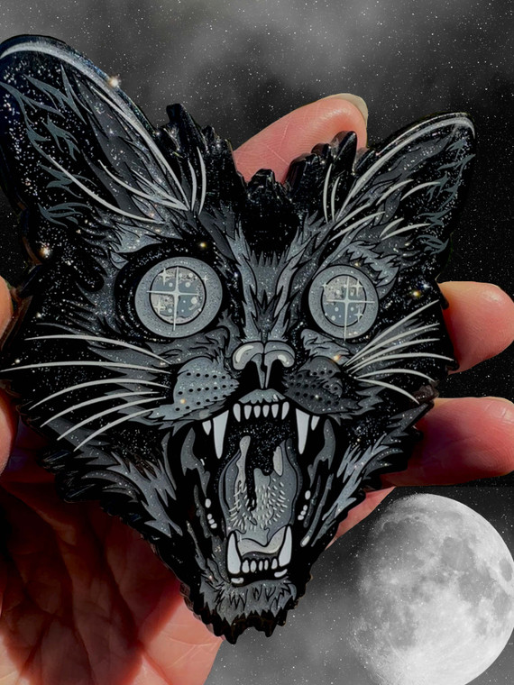 FERAL large enamel artist pin close up showing the sparkly glitter details