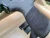 Tactical tape is being wrapped around the grip.