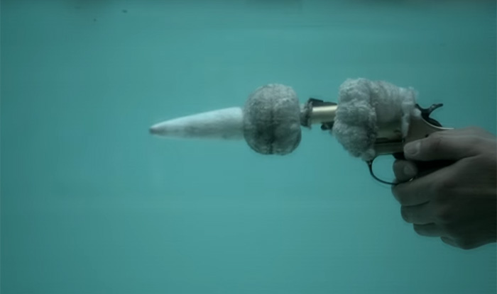 gun being fired underwater