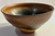 2.	Chawan:  A tenmoku-style tea bowl with a dark iron-rich hare’s-fur glaze.