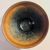 2.	Chawan:  A tenmoku-style tea bowl with a dark iron-rich hare’s-fur glaze.