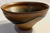 2.	Chawan:  A tenmoku-style tea bowl with a dark iron-rich hare’s-fur glaze.