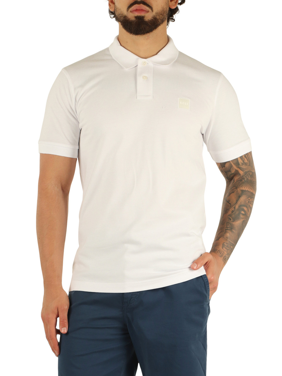 BIANCO | Polo slim fit in cotone piquet con patch logo frontale