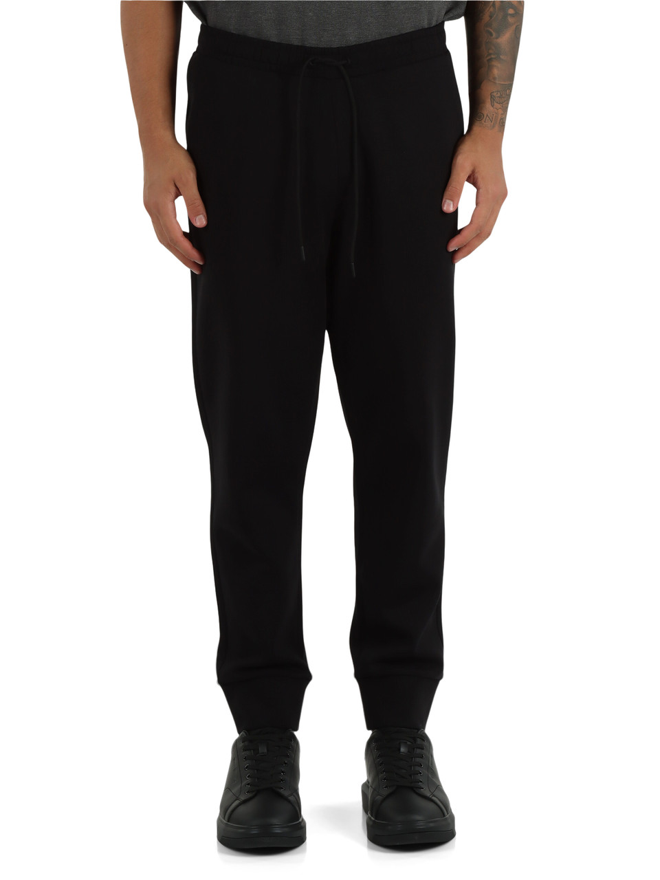 NERO | Pantaloni sportivi in cotone stretch con scritta logo a rilievo