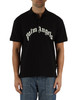 NERO | Polo in cotone piquet con scritta logo frontale