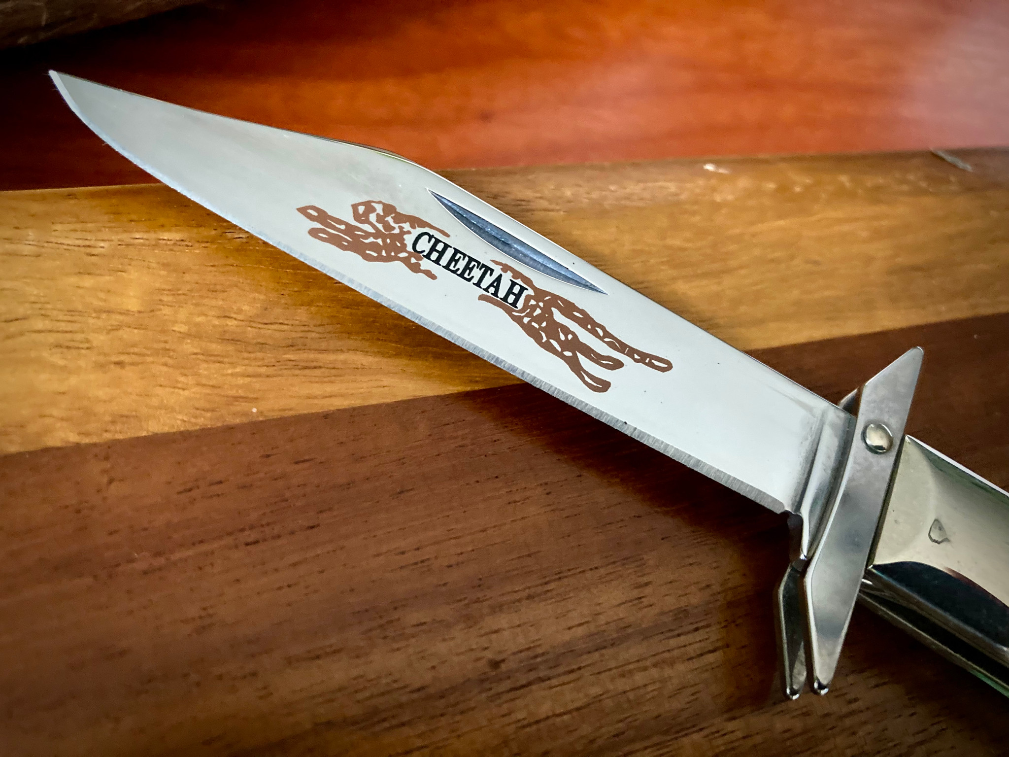 CASE XX SELECT 6111 1/2L CHEETAH KNIFE, 2002, JIGGED BERMUDA GREEN