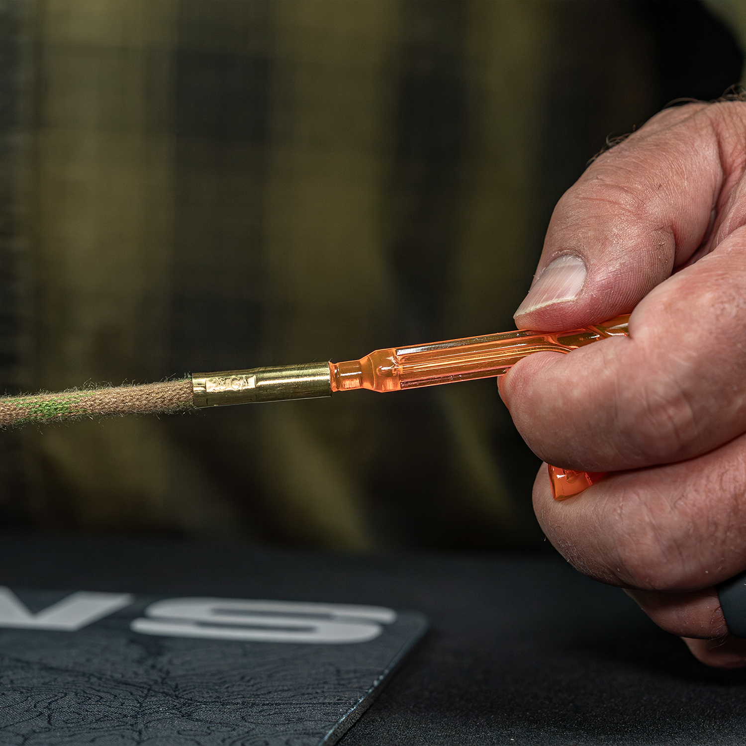 
Product image of Otis Technology .30 cal Rifle/Pistol Ripcord® in use  with Bore Reflector+ used as a pull handle
