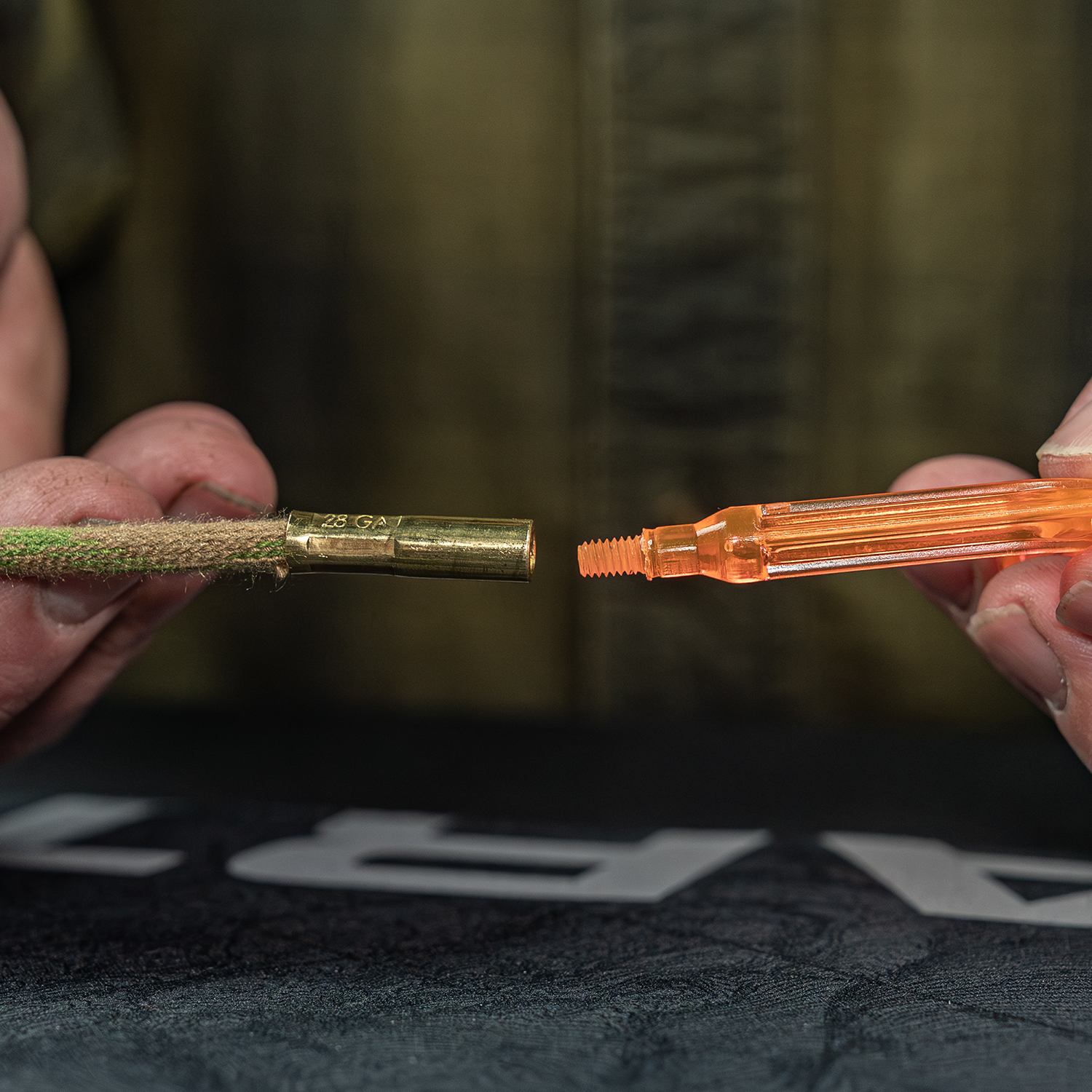 Product image of Otis Technology .30 cal Rifle/Pistol Ripcord® in use  with Bore Reflector+ used as a pull handle
