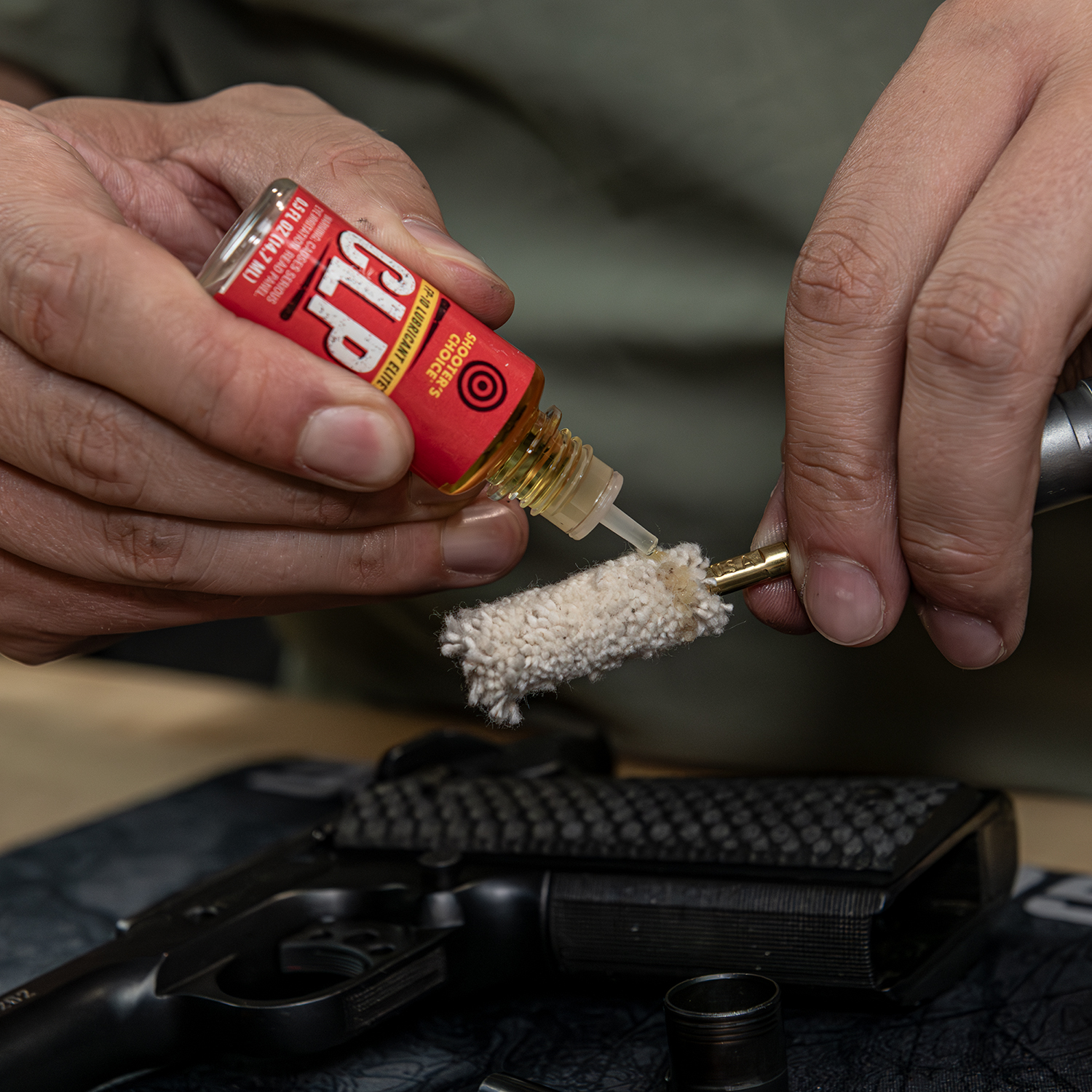 Lifestyle image of  image of Otis Technology .45 Cal Pistol Cleaning Kit in use