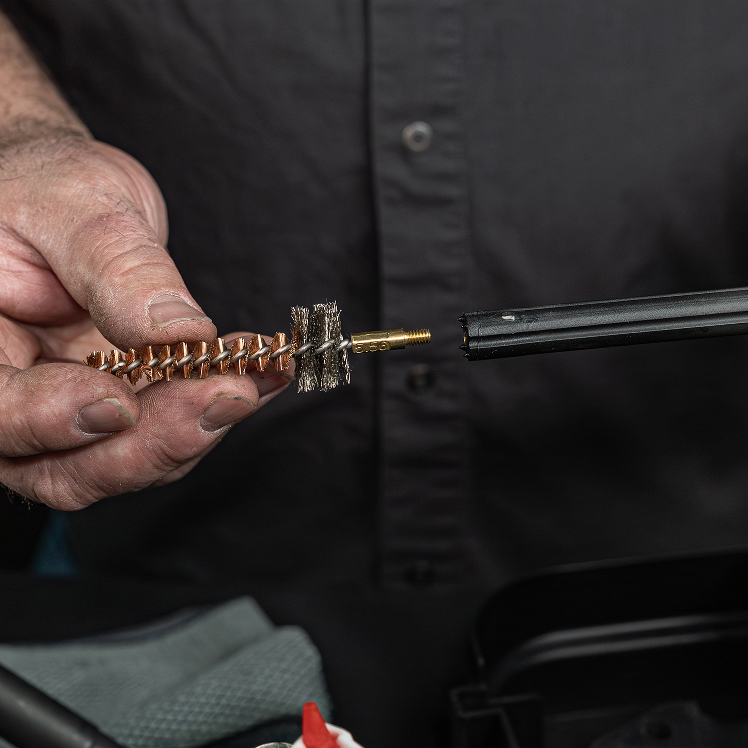 Lifestyle image of Otis Technology AR Elite Range Box Gun Care System for .223/5.56  chamber brush shown in use