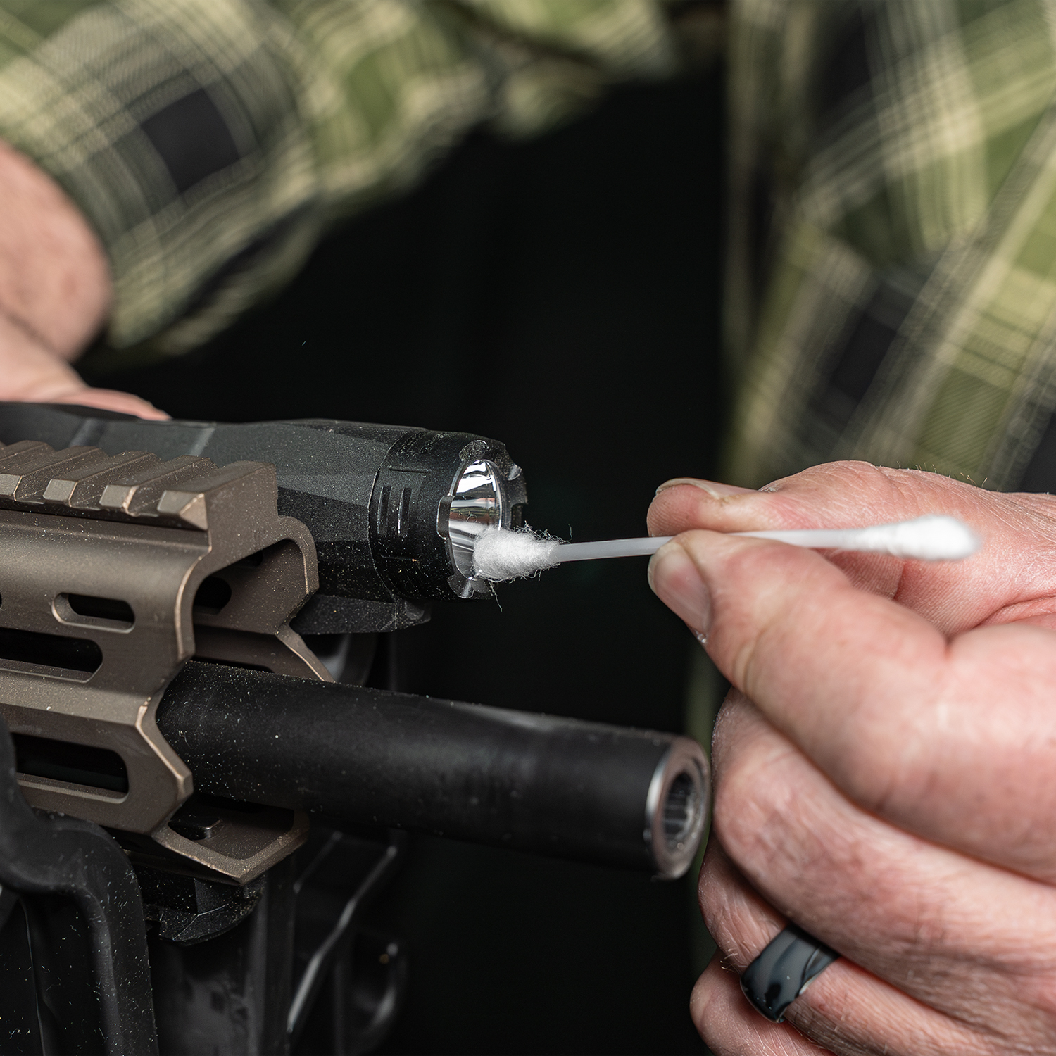 Lifestyle image of Otis Technology AR Elite Range Box Gun Care System for .223/5.56 cotton swab shown in use