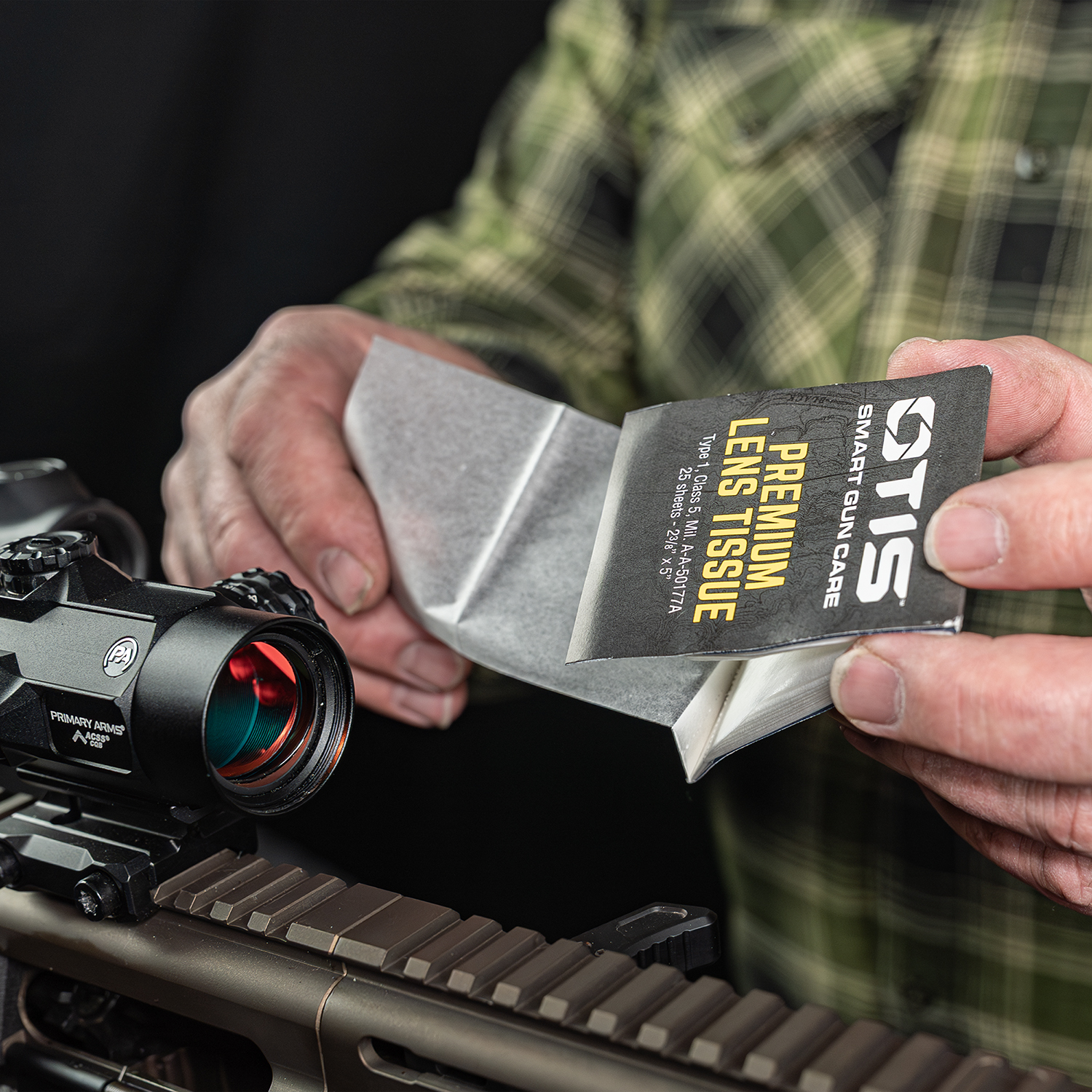 Lifestyle image of Otis Technology AR Elite Range Box Gun Care System for .223/5.56  lens tissue shown in use