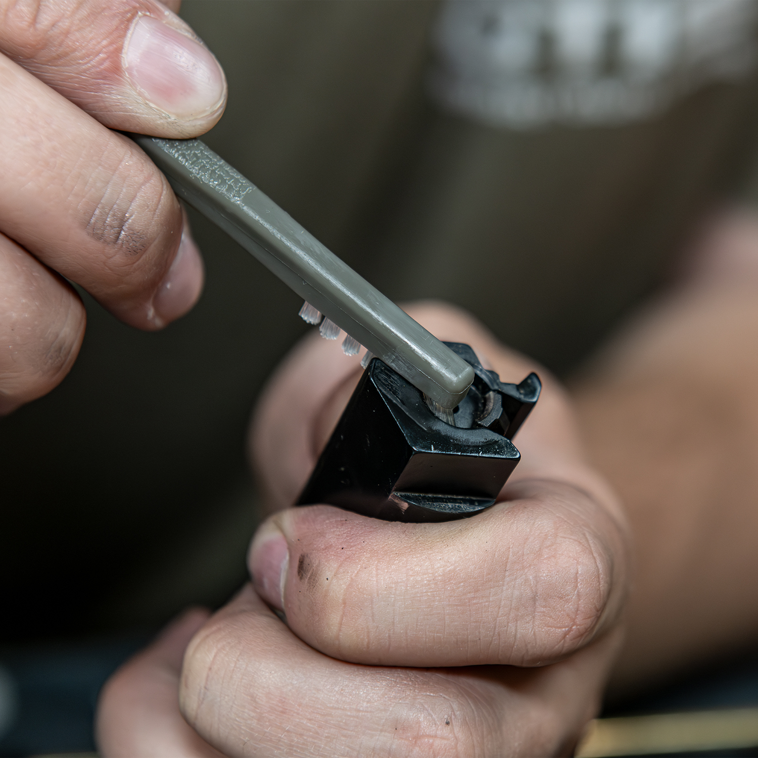 Lifestyle image of Otis Technology Sectional Rod Multi-Caliber Pistol Cleaning Kit in use