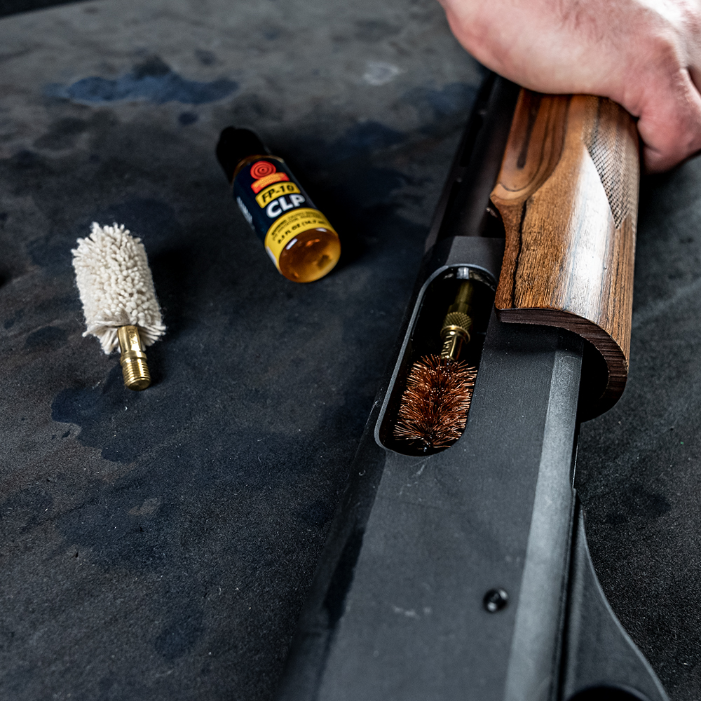 Lifestyle Image of Otis Technology Sectional Rod Multi-Gauge Shotgun Cleaning Kit in use