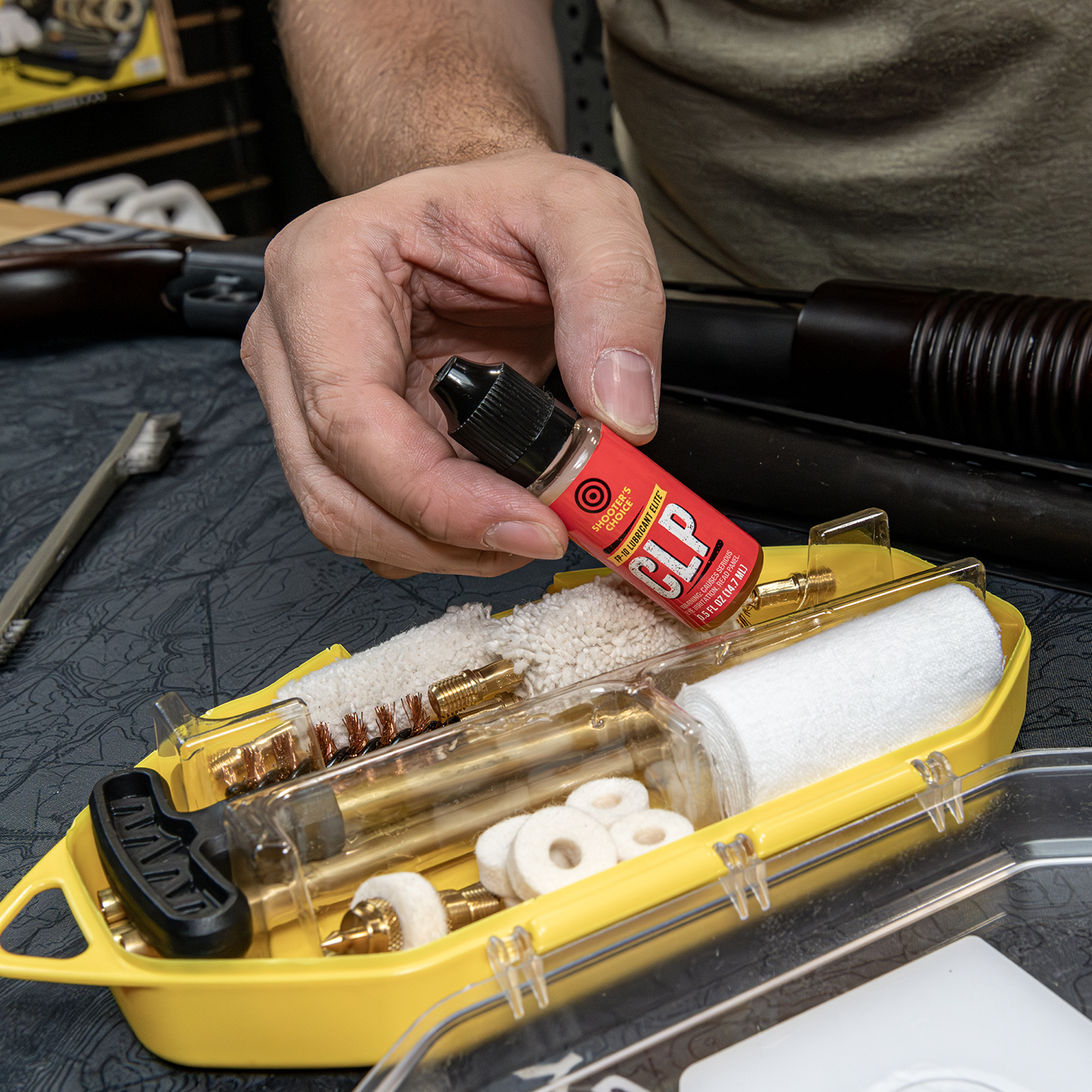 Lifestyle Image of Otis Technology Sectional Rod Multi-Gauge Shotgun Cleaning Kit in use