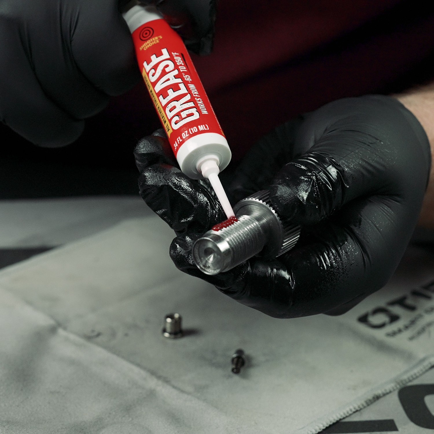 Lifestyle image of Shooter's Choice Muzzleloader Cleaning Accessory Pack grease in use