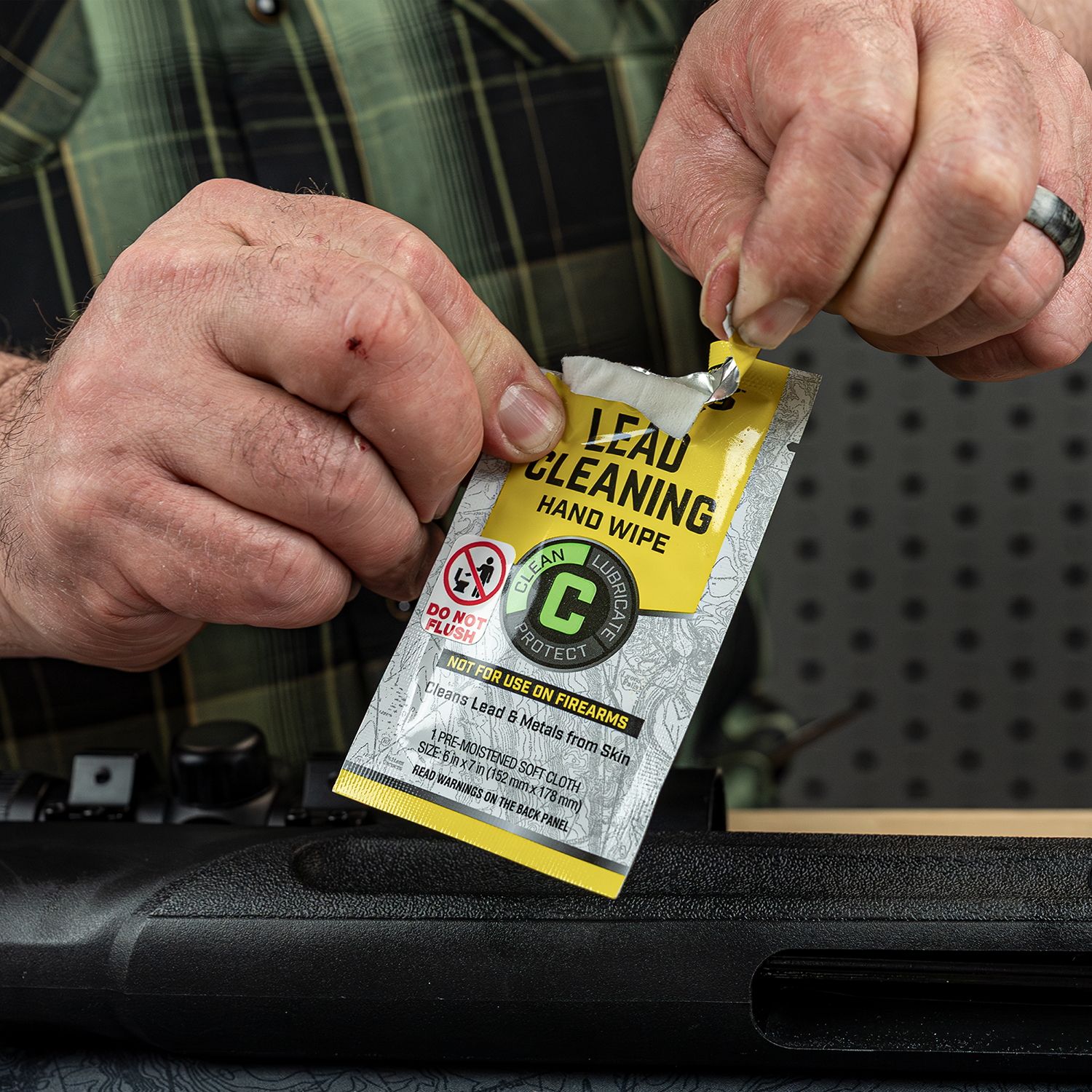 Lifestyle image of Otis Technology Lead Cleaning Hand Wipe Individually Wrapped  beign opened