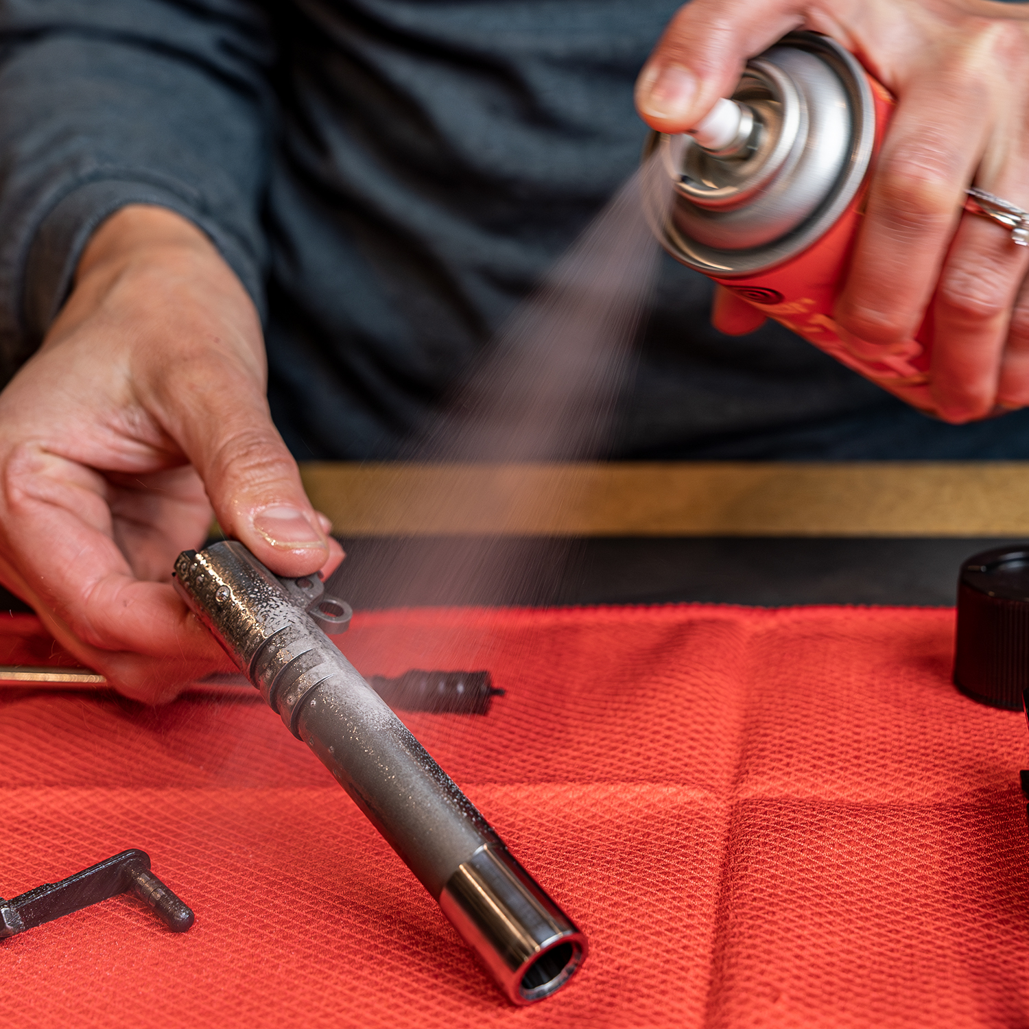 Lifestyle image of Shooter's Choice FP-10 Lubricant Elite® CLP Aerosol 4 oz  in use