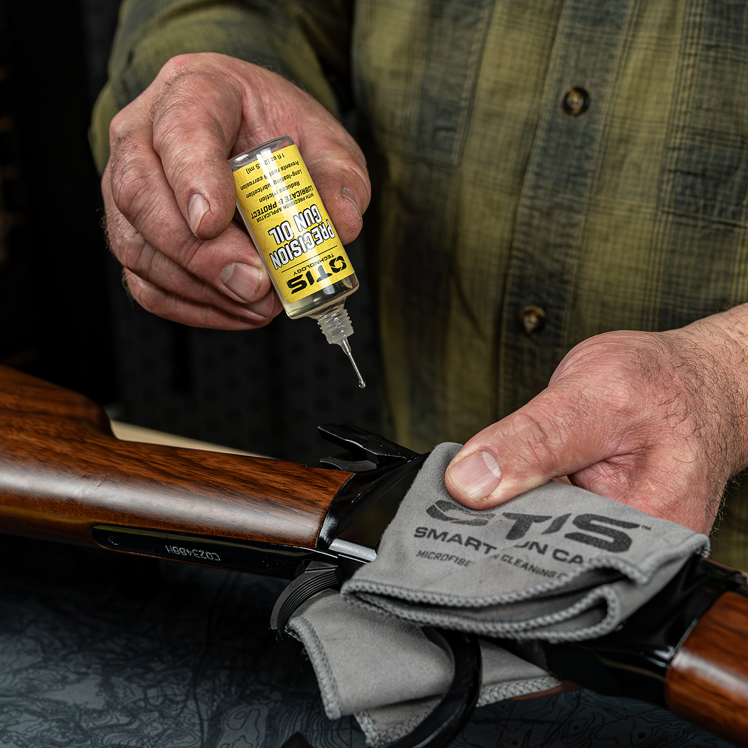 Lifestyle image of Otis Technology Precision Gun Oil 1 ounce in use