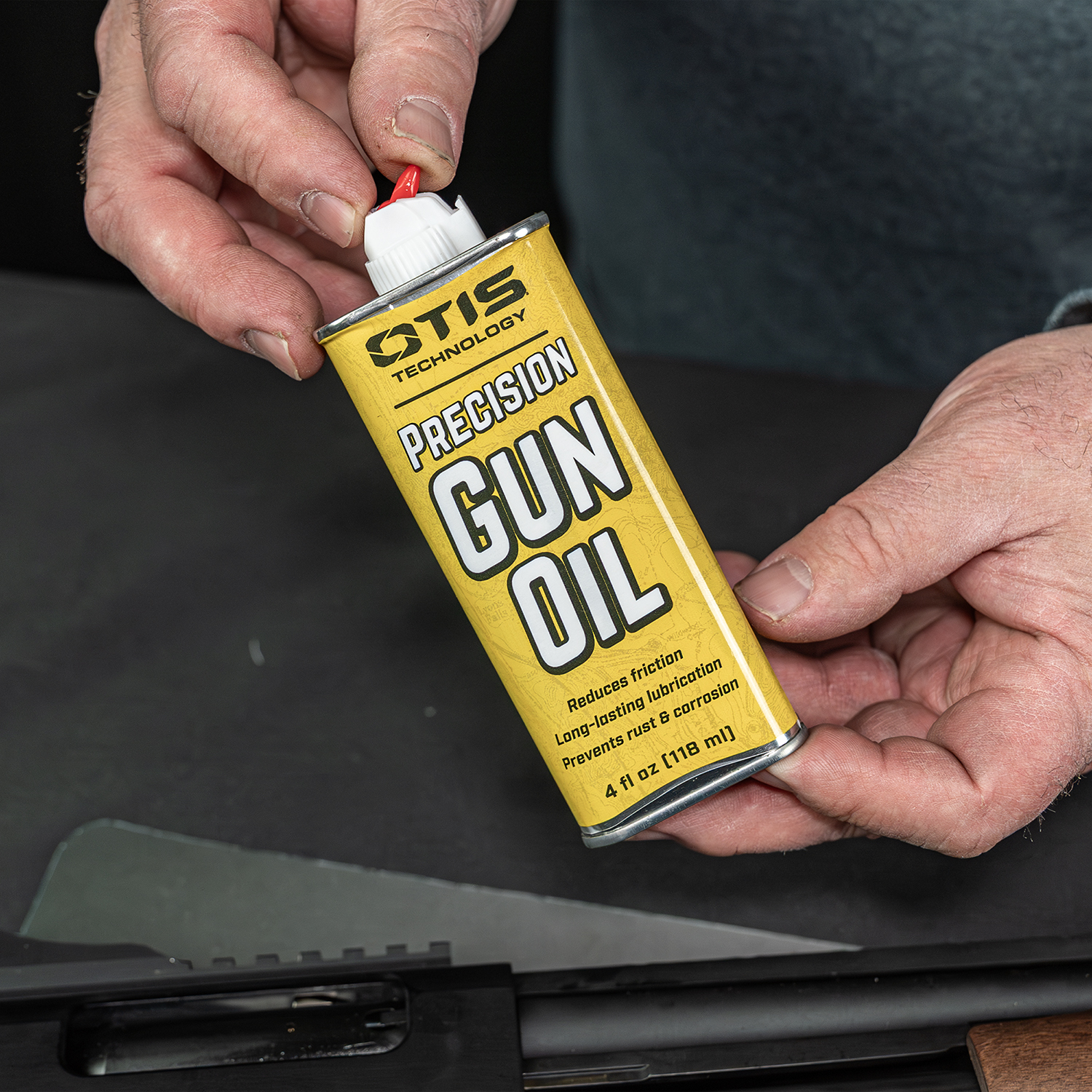 Lifestyle image of Otis Technology Precision Gun Oil 4oz tin in use 