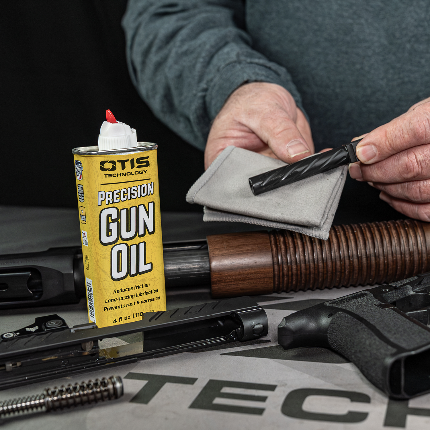 Lifestyle image of Otis Technology Precision Gun Oil 4oz tin in use 