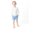 Boys Octopus Icon swim trunks on model showing fit and above-the-knee length.