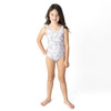 Girls wildflower print one piece swimsuit on model showing fit.