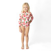 Girls strawberry print long sleeve swimsuit with soft stretch fabric, stylish kids swimwear shown on model.