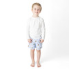 Boys teddy bear print swim trunks with stretch fabric, cute kids swimwear shown on model.
