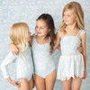 Girls blue one piece swimsuit with crochet skirt cover up, coordinated kids swimwear set shown on models.
