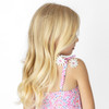 Girls daisy print one piece swimsuit with smocked texture and tie shoulder straps, stylish kids swimwear detail.