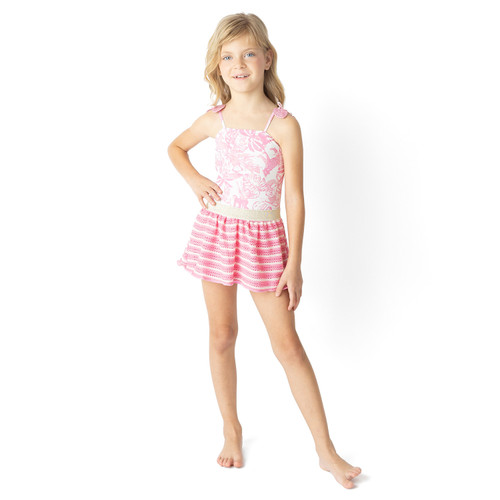 Girls Pink Paradise smocked one piece and crochet skirt swim set on model showing fit and length.