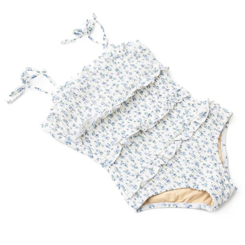 Full front view of the Shade Critters swimsuit showcasing the smocked texture and delicate floral details.