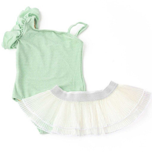 The Shimmer Mint swimsuit by Shade Critters, featuring its one-shoulder design with a large, soft ruffles and the shimmering mint fabric. The matching pleated tutu skirt is placed beside it, showing the complete set.
