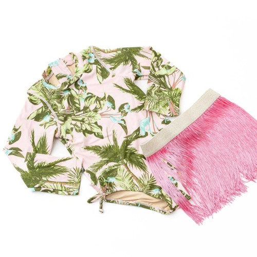 Shade Critters Blush Tropics long-sleeve suit paired with a playful fringe skirt.