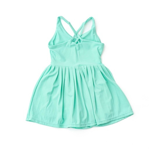 Shade Critters Green Girls Pleated Active Dress  back view with crisscross straps and clean athletic finish.