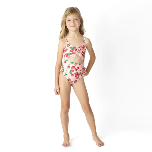 Girls strawberry bliss monokini swimsuit with cut out design, cute kids swimwear shown on model.