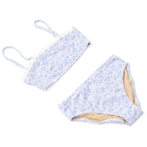Tween girls blue floral bikini set with crochet trim and soft stretch fabric, stylish kids two piece swimwear.