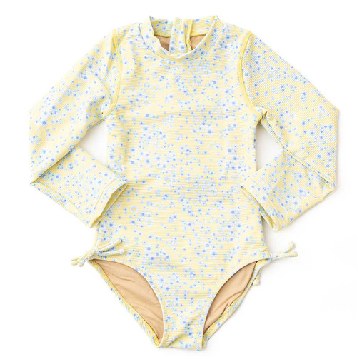 Shade Critters girls ribbed long sleeve one piece swimsuit in butter blooms floral print, soft yellow kids swimwear with full coverage design.