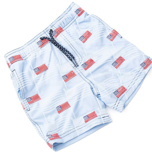 Boys light blue swim trunks with patriotic flag pattern and drawstring waist, comfortable kids swimwear.