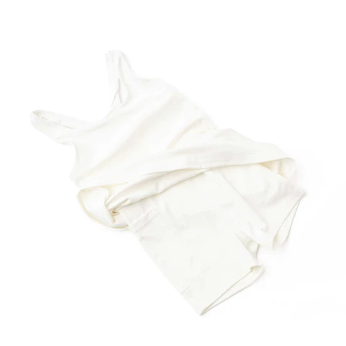 Girls white athletic dress with built-in shorts and flexible fit, functional kids activewear.