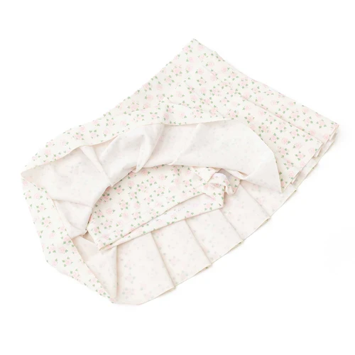 Girls pink floral active skirt with built-in shorts and pleated layers, functional kids activewear.