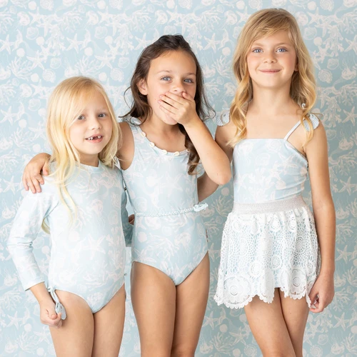 Girls blue one piece swimsuit in snorkel splash print, stylish kids swimwear shown in group beachwear look.