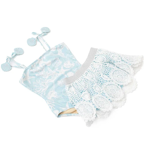 Girls blue one piece swimsuit set with crochet skirt cover up, stylish kids swimwear with textured detail.